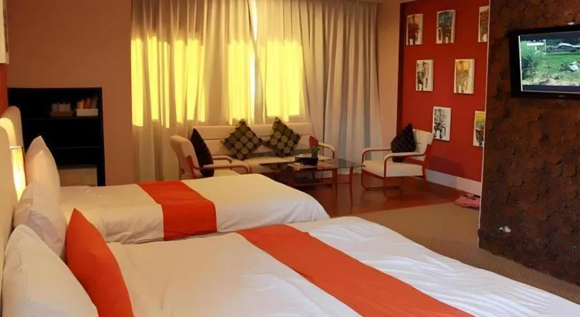 Bed in Cactus Resort & Hotel