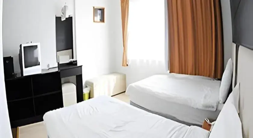 Bed in Cactus Resort & Hotel Bed in Cactus Resort & Hotel