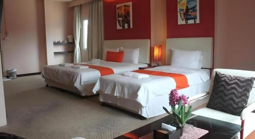 Bed in Cactus Resort & Hotel