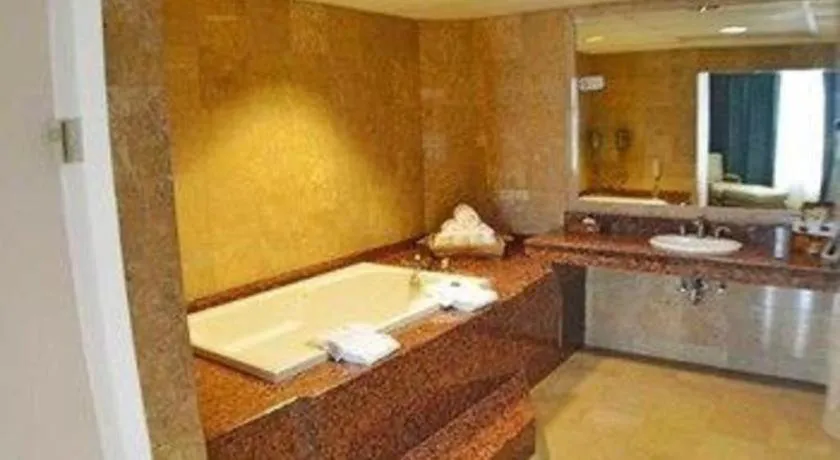 Bed in Hotel Honduras Maya