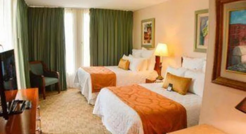 Bed in Hotel Honduras Maya