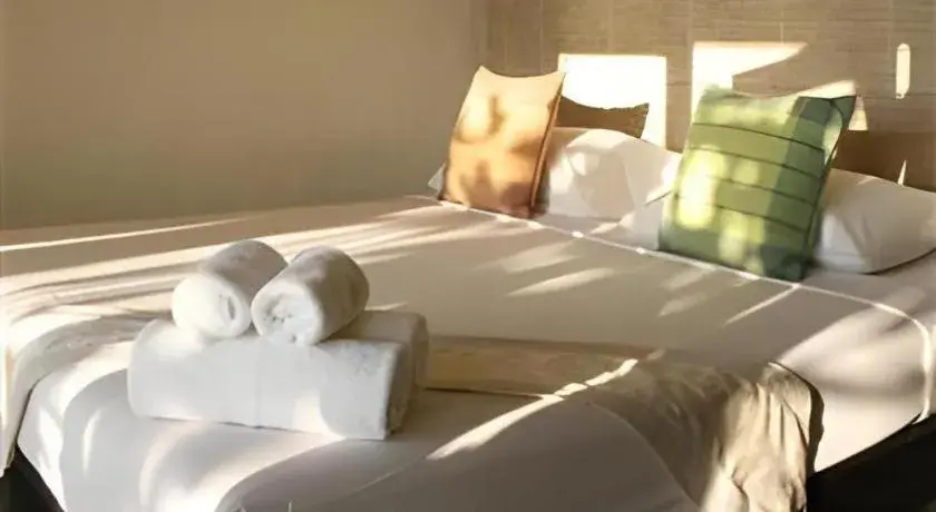 Bed in Tamarina Resort Bed in Tamarina Resort