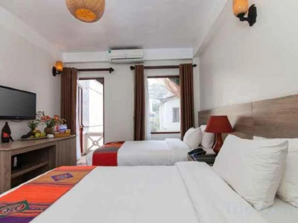 Bed in Chapa Dew Boutique Hotel