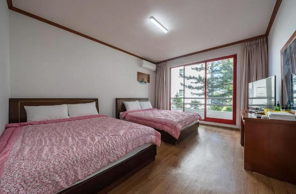 Bed in Gangneung Gyeongpodae Gangneung Motel