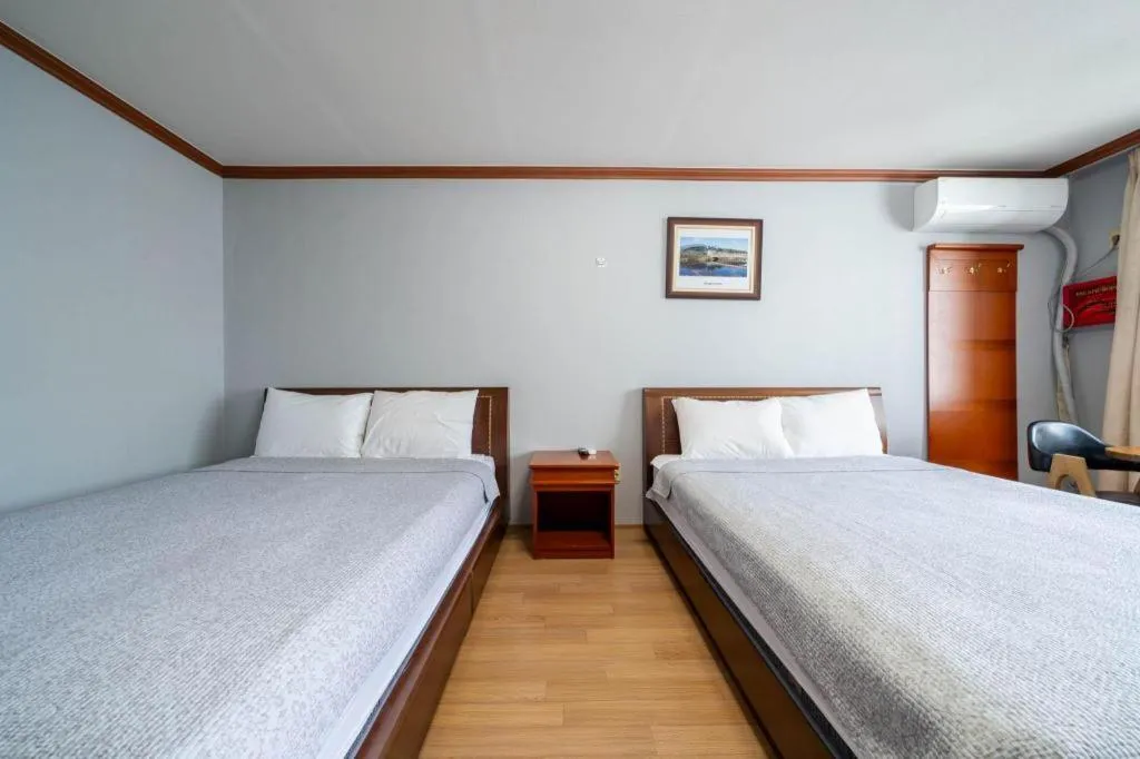 Bed in Gangneung Gyeongpodae Gangneung Motel