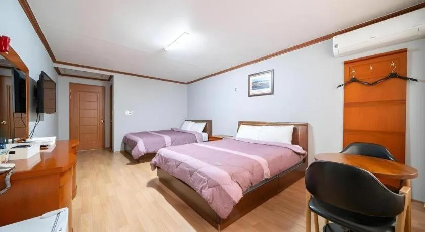 Bed in Gangneung Gyeongpodae Gangneung Motel