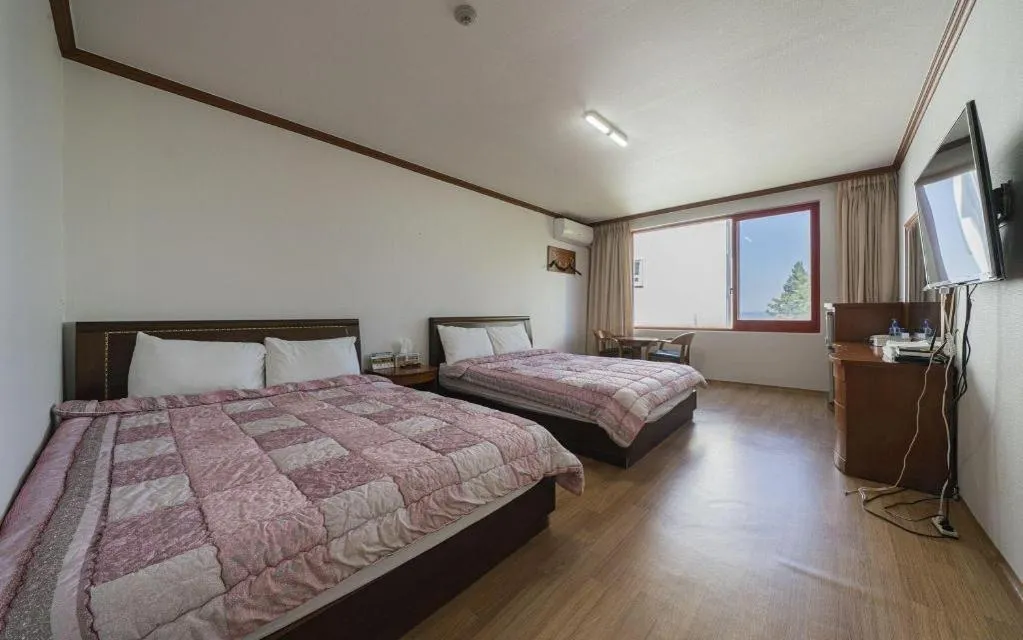Bed in Gangneung Gyeongpodae Gangneung Motel