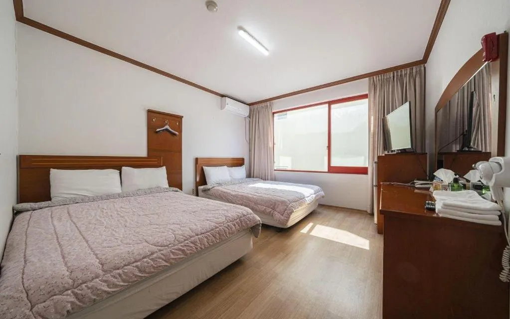 Bed in Gangneung Gyeongpodae Gangneung Motel