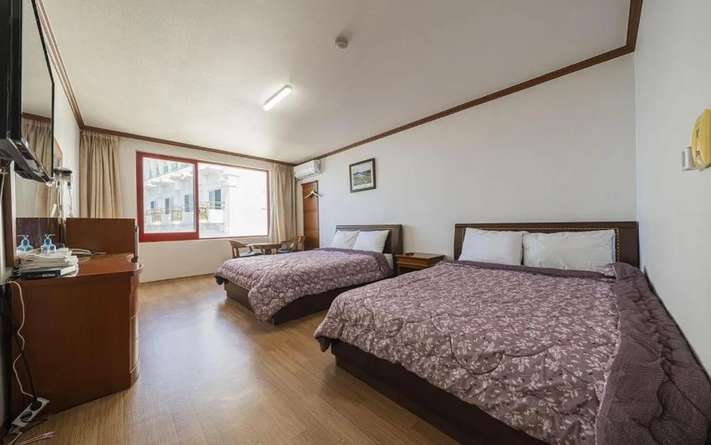 Bed in Gangneung Gyeongpodae Gangneung Motel