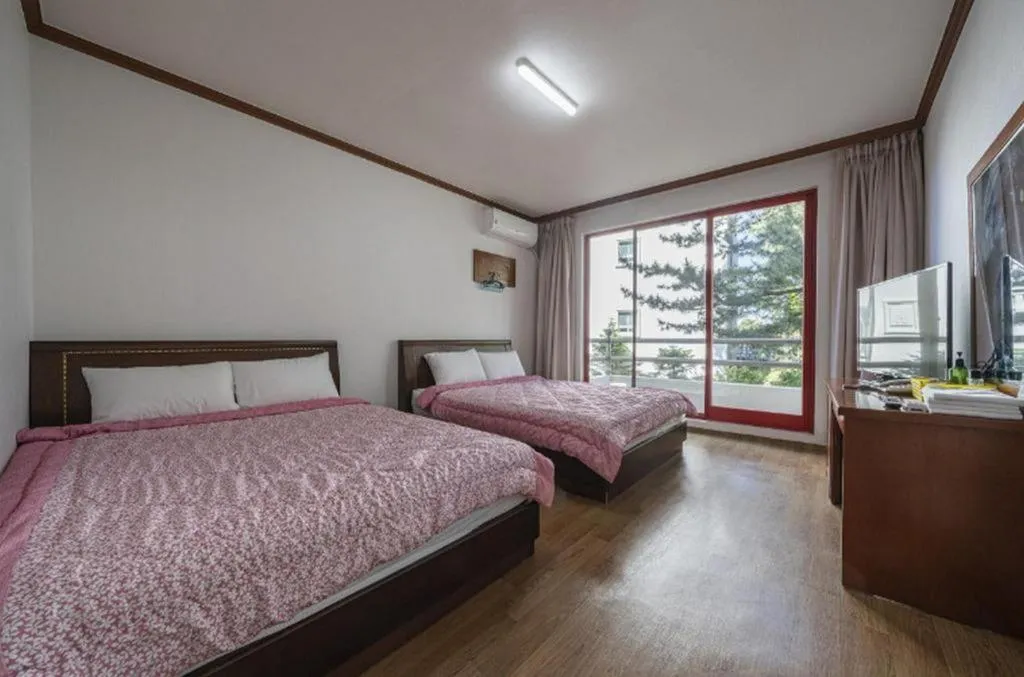 Bed in Gangneung Gyeongpodae Gangneung Motel