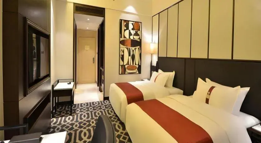 Bed in Holiday Inn Guangzhou Airport Zone By IHG Bed in Holiday Inn Guangzhou Airport Zone By IHG