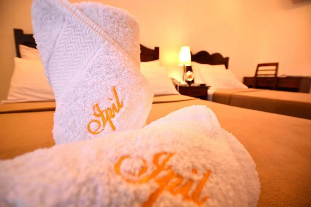 Bed in Ipil Suites Puerto Princesa