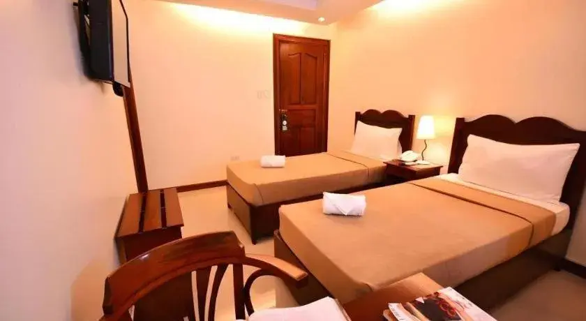 Bed in Ipil Suites Puerto Princesa Bed in Ipil Suites Puerto Princesa