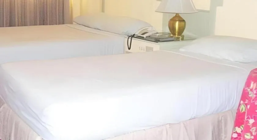 Bed in Cebu Northwinds Hotel