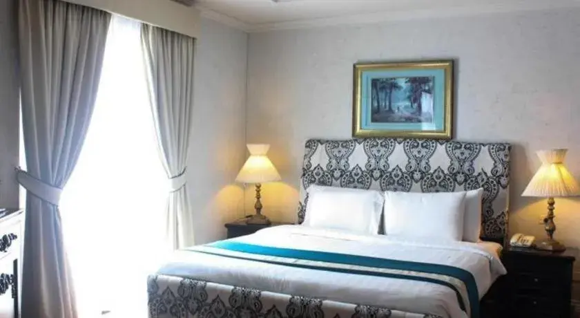 Bed in Queen Margarette Hotel Bed in Queen Margarette Hotel