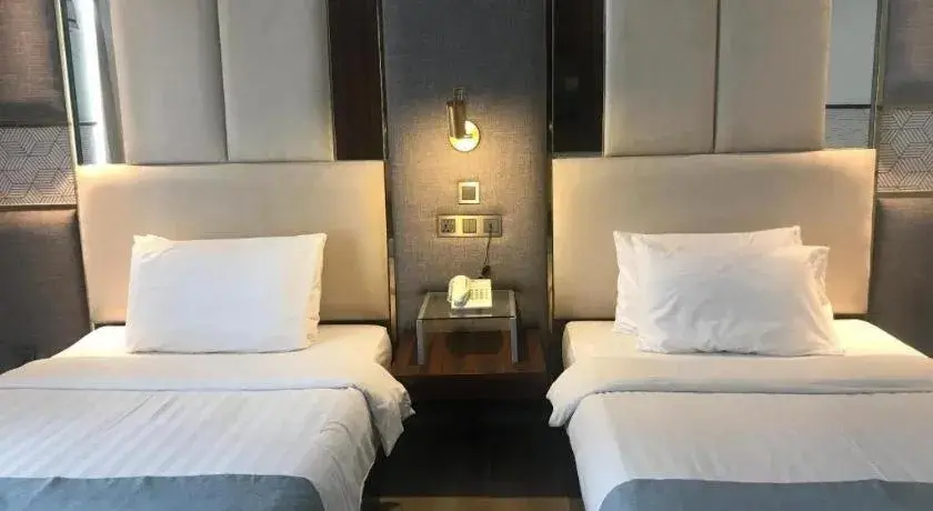 Bed in Queen Margarette Hotel Bed in Queen Margarette Hotel