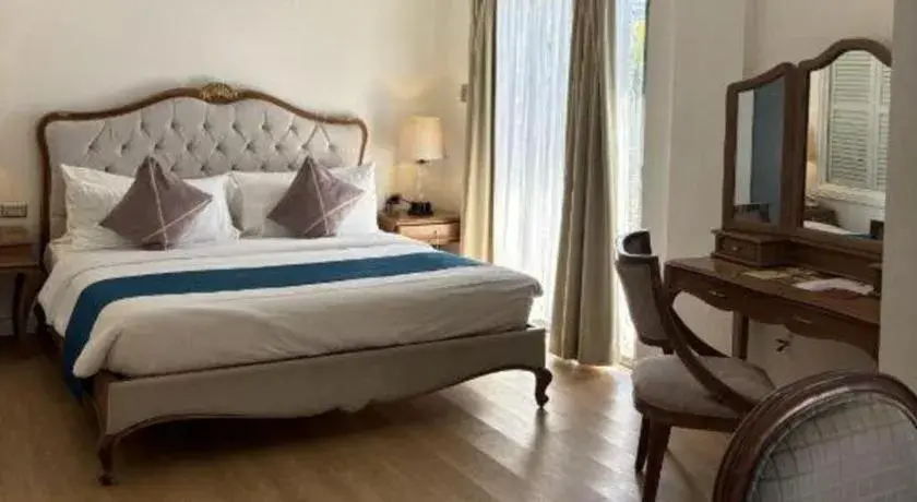 Bed in Queen Margarette Hotel Bed in Queen Margarette Hotel