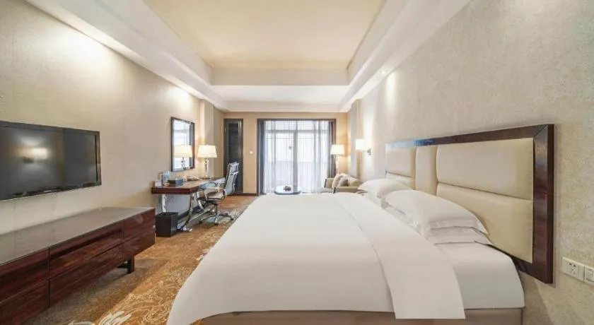 Bed in Country Garden Phoenix Hotel Yunfu