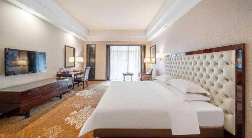 Bed in Country Garden Phoenix Hotel Yunfu