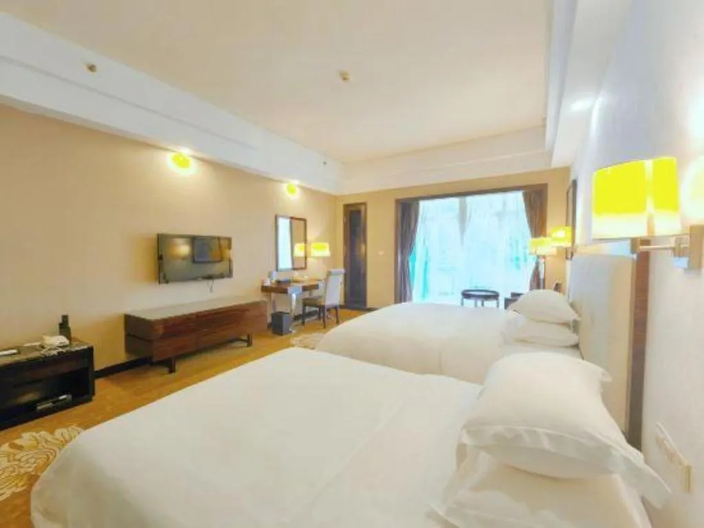 Bed in Country Garden Phoenix Hotel Yunfu