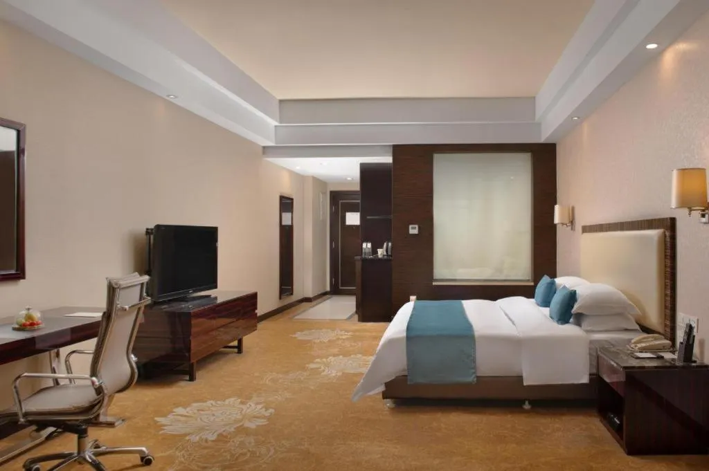 Bed in Country Garden Phoenix Hotel Yunfu