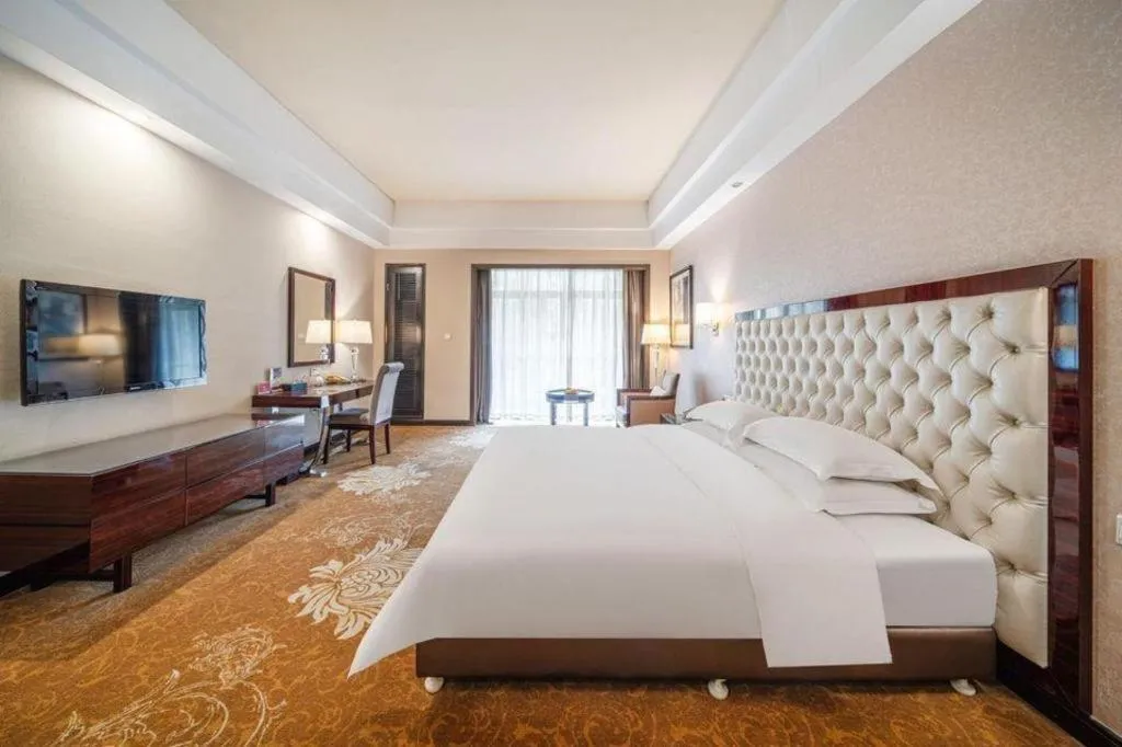 Bed in Country Garden Phoenix Hotel Yunfu