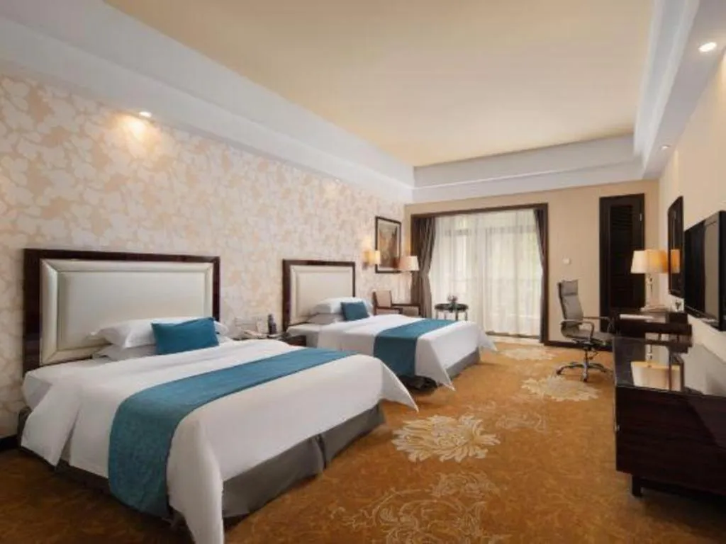 Bed in Country Garden Phoenix Hotel Yunfu