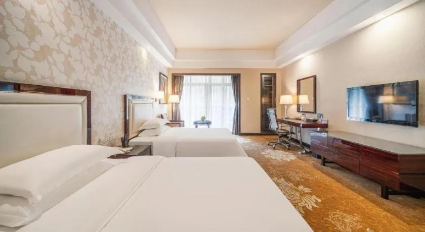 Bed in Country Garden Phoenix Hotel Yunfu