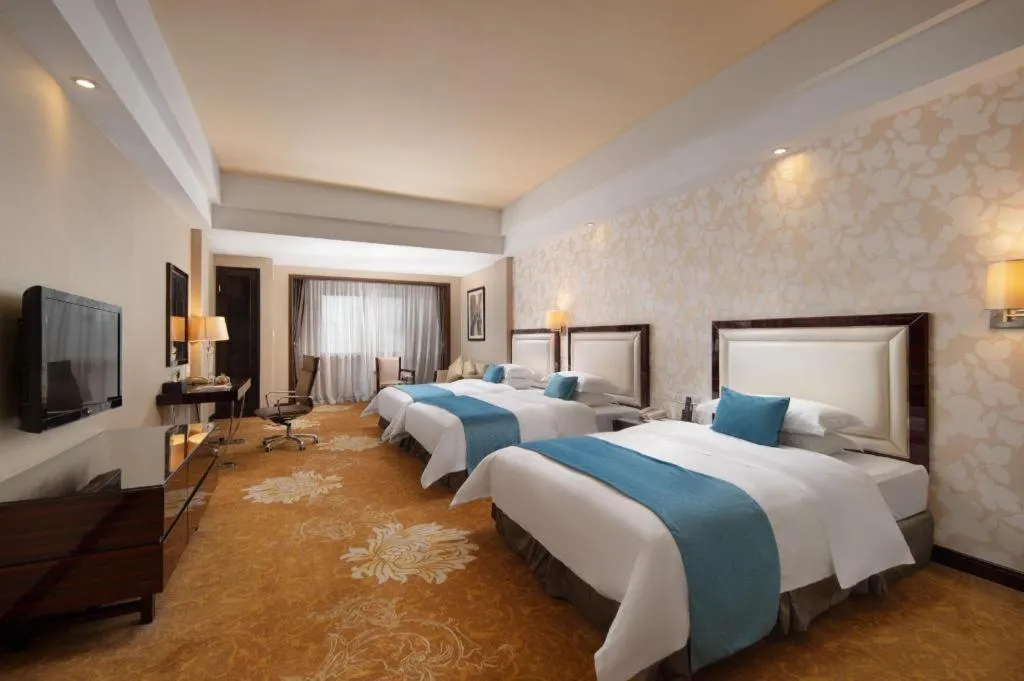 Bed in Country Garden Phoenix Hotel Yunfu