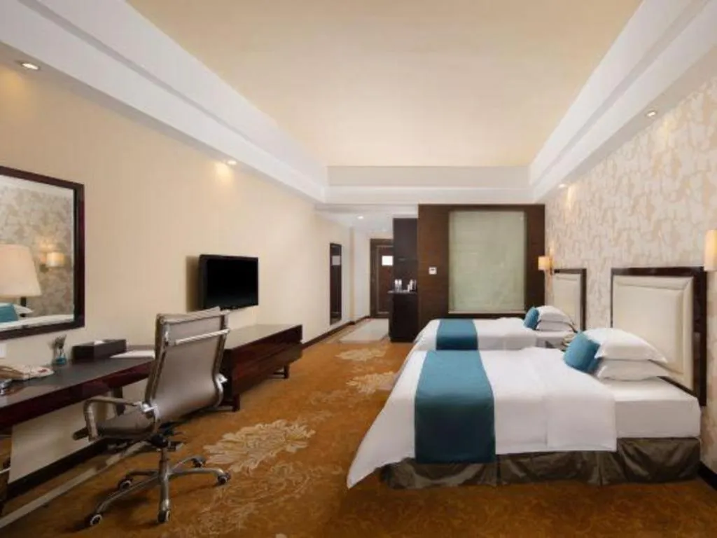 Bed in Country Garden Phoenix Hotel Yunfu