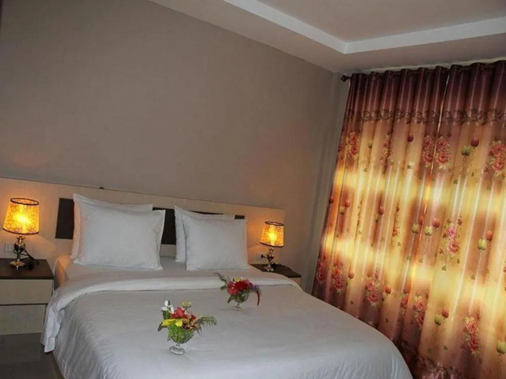 Bed in Samosir Cottages Resort