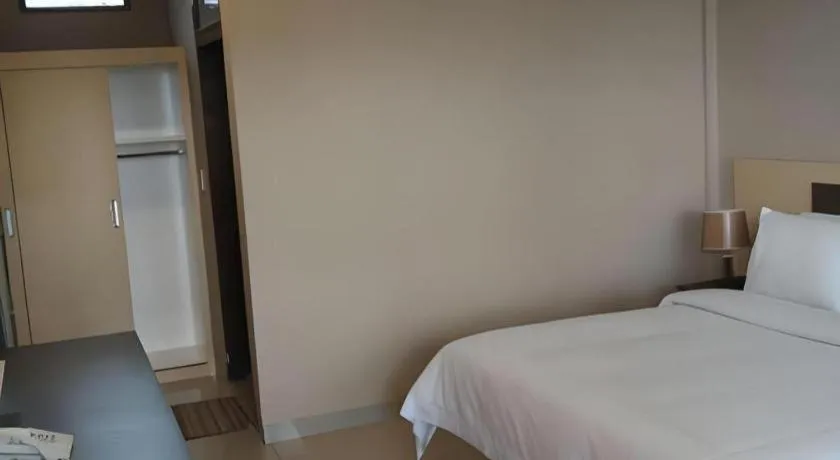 Bed in Samosir Cottages Resort