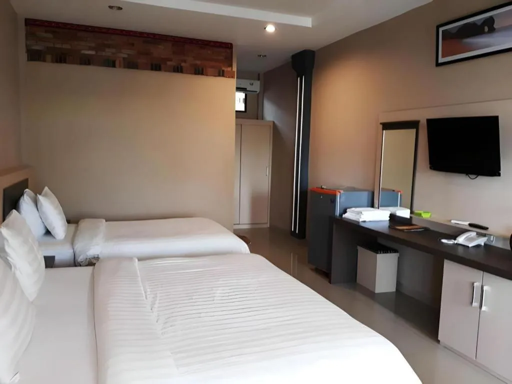 Bed in Samosir Cottages Resort
