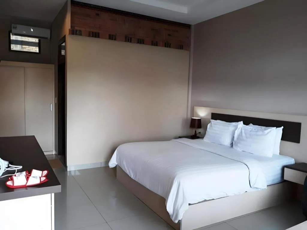 Bed in Samosir Cottages Resort