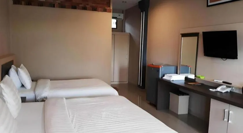 Bed in Samosir Cottages Resort
