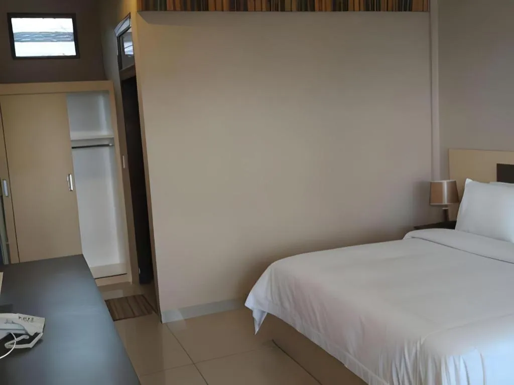 Bed in Samosir Cottages Resort