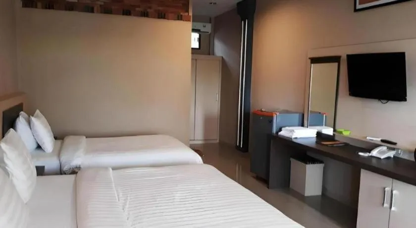 Bed in Samosir Cottages Resort