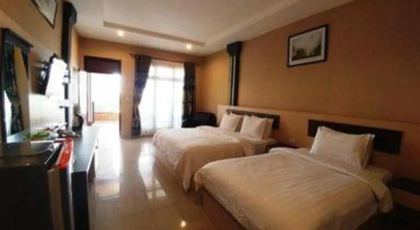 Bed in Samosir Cottages Resort