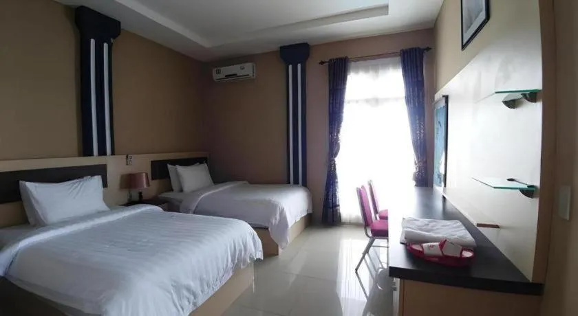 Bed in Samosir Cottages Resort