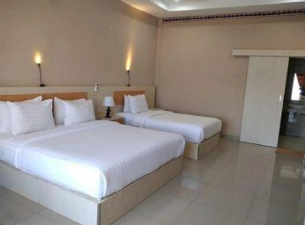 Bed in Samosir Cottages Resort