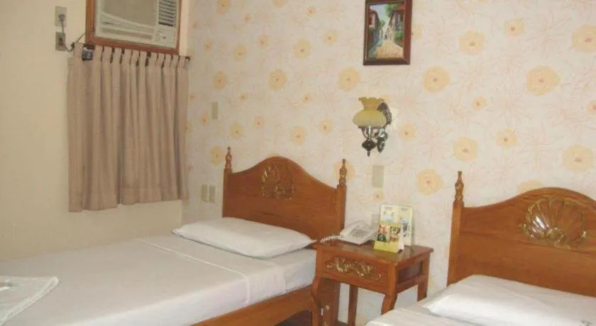 Bed in Pearlmont Hotel