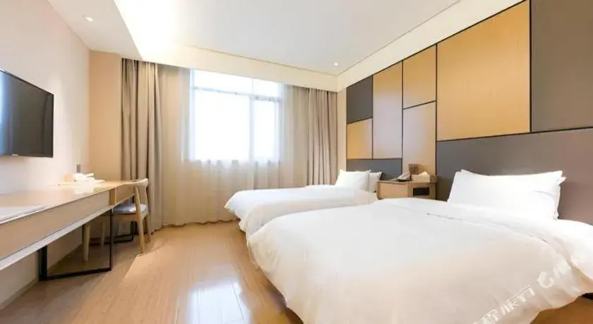 Bed in JI Hotel Shanghai Zhangjiang Bed in JI Hotel Shanghai Zhangjiang