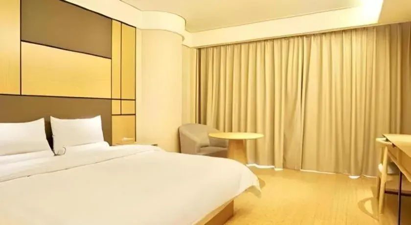 Bed in JI Hotel Shanghai Zhangjiang Bed in JI Hotel Shanghai Zhangjiang