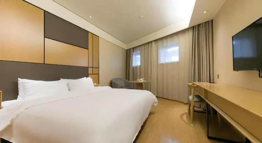 Bed in JI Hotel Shanghai Zhangjiang Bed in JI Hotel Shanghai Zhangjiang