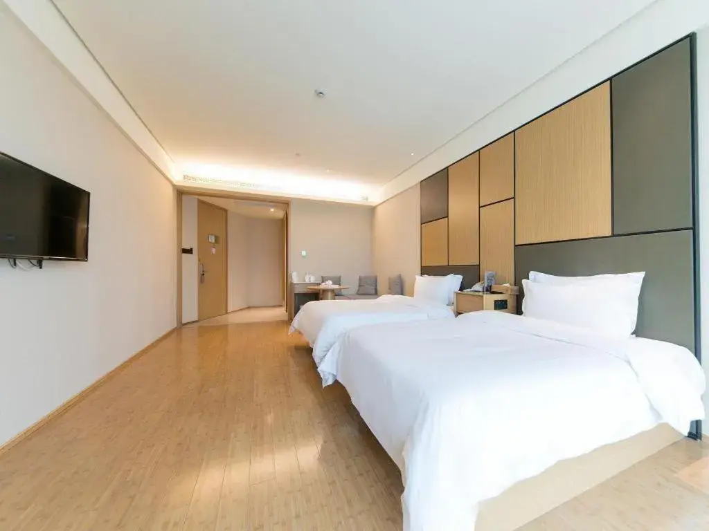 Bed in JI Hotel Shanghai Zhangjiang Bed in JI Hotel Shanghai Zhangjiang