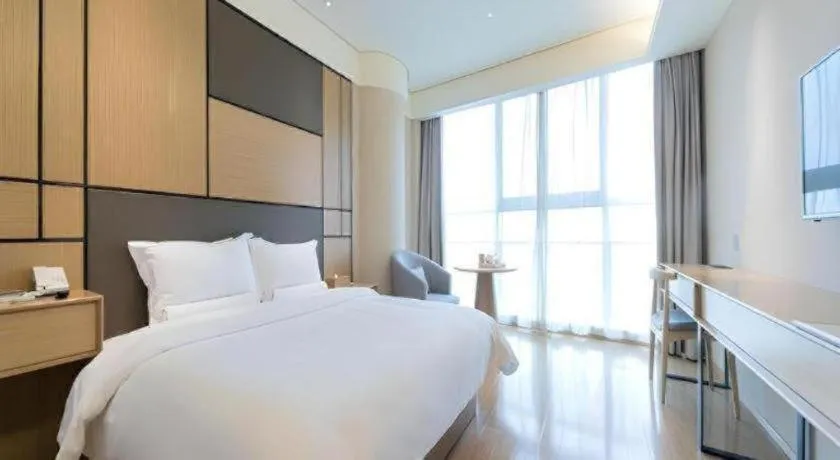 Bed in JI Hotel Shanghai Zhangjiang