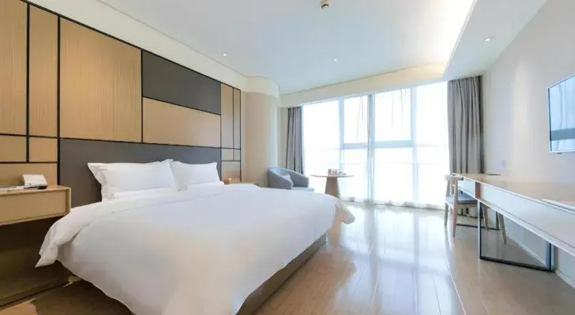 Bed in JI Hotel Shanghai Zhangjiang Bed in JI Hotel Shanghai Zhangjiang