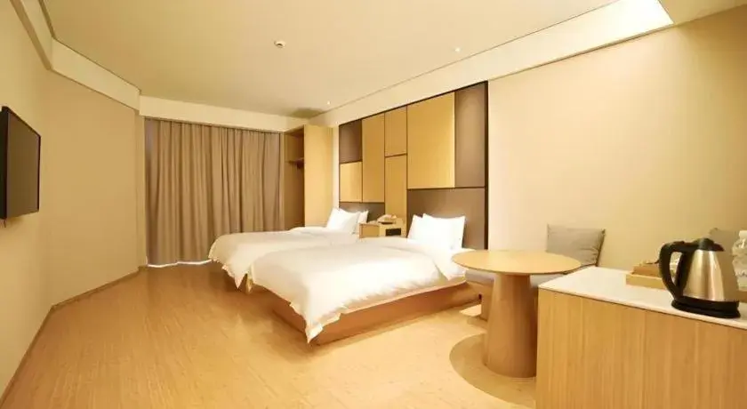 Bed in JI Hotel Shanghai Zhangjiang Bed in JI Hotel Shanghai Zhangjiang