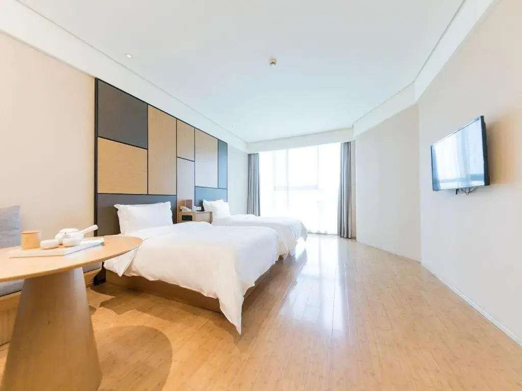 Bed in JI Hotel Shanghai Zhangjiang Bed in JI Hotel Shanghai Zhangjiang