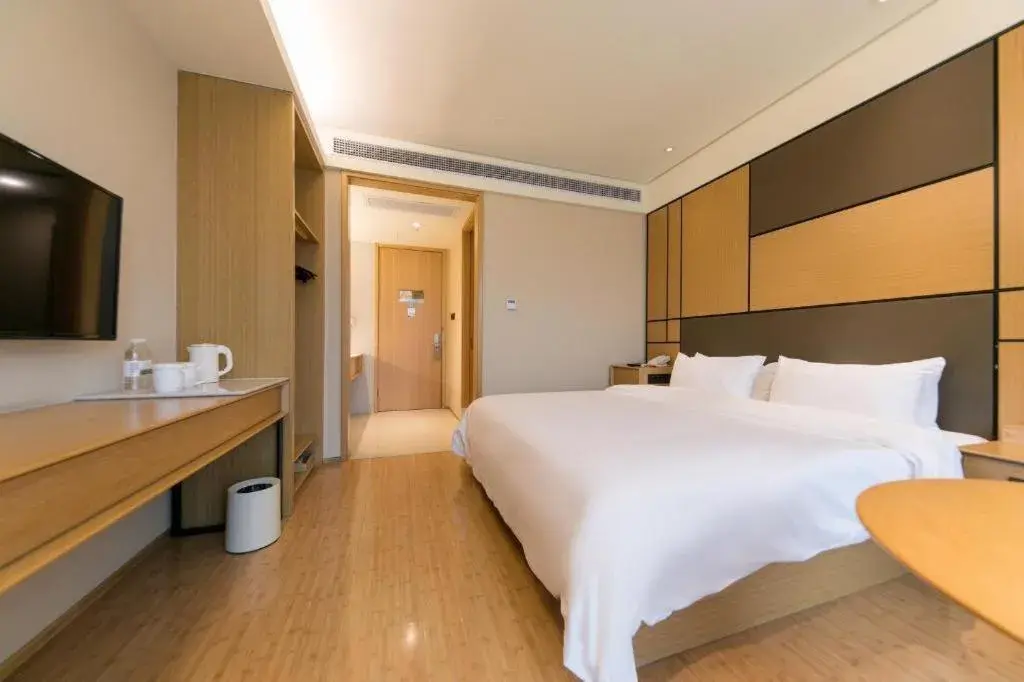 Bed in JI Hotel Shanghai Zhangjiang Bed in JI Hotel Shanghai Zhangjiang
